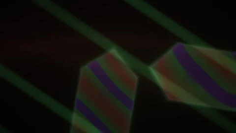 Glass prisms refracting green laser beams in dark. Stock Footage 337460142