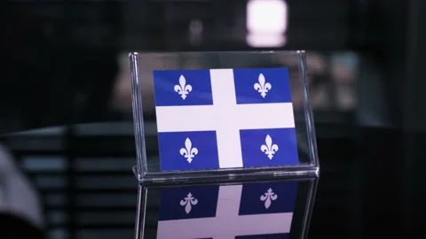Glass Quebec Flag Rotating On Table 動画素材 208517139