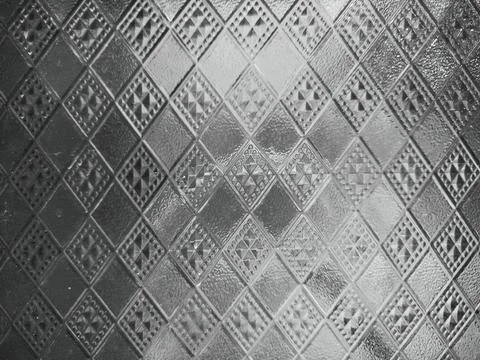 Glass with a raised square pattern template background Stock Photos