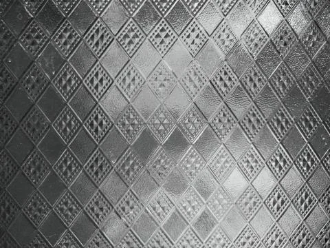 Glass with a raised square pattern template background Stock Photos