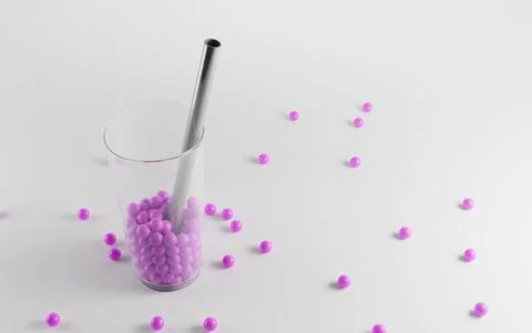 Glass of raspberry fruit balls and metal straw for bubble tea drink top view Stock Illustration