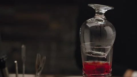 Glass with Raspberry Sambuca Stock Footage 131376717