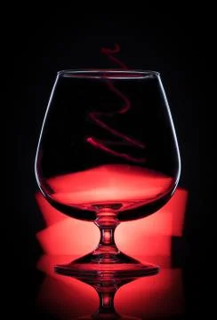 Glass in red Stock Photos