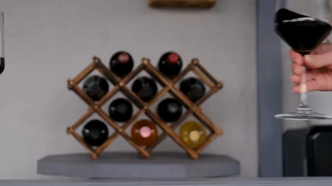 Glass of red wine in hands. Selective focus. Stock Footage 307436193