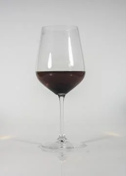 Glass of red wine in vertical format Stock Photos