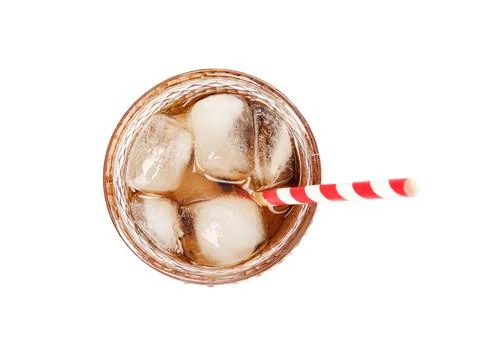 Glass of refreshing cola with ice cubes and straw on white background, top vi Stock Photos
