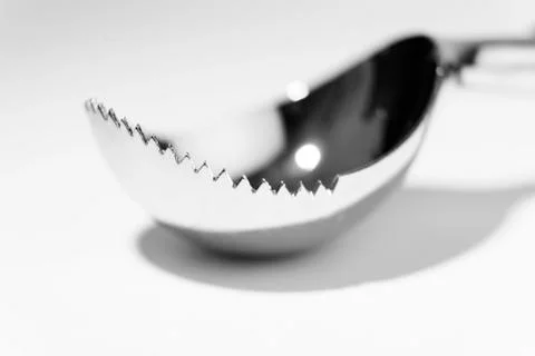 A glass scoop with sharp teeth to be able to pick up more at each time 写真素材