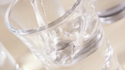A glass shot on a light table and alcohol Stock-Footage 91584630