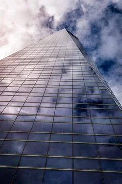 Glass skyscraper facade and cloud reflections, Madrid, Spain Stock Photos