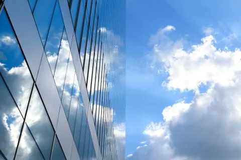 Glass skyscraper reflection cloudy sky Stock Photos