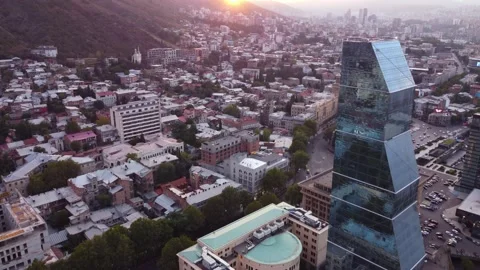 Glass skyscraper at sunset Stock Footage 168564427