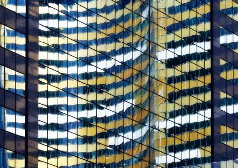 Glass skyscraper windows pattern with reflections Stock Photos