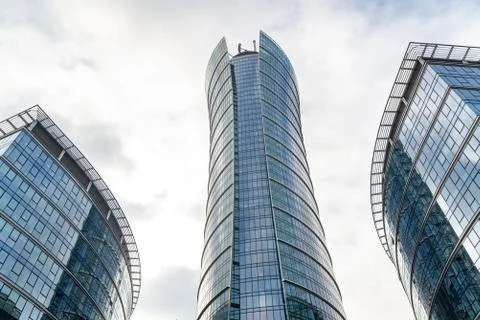 Glass skyscrapers of irregular shape. Bottom view. Abstract architectural detail Stock Photos