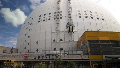 Glass Skyview Elevator Moving Up Avicii Arena Exterior in Stockholm, Sweden Stock Footage 341012069