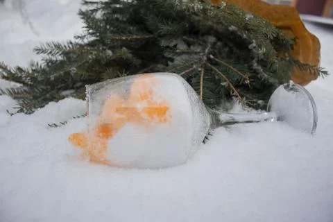 Glass in the snow Stock Photos