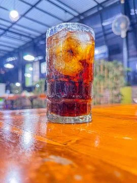 A Glass Of Softdrink with ice cube Stock Photos