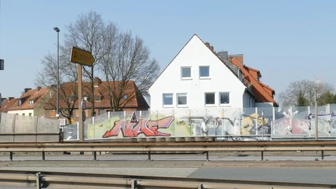 Glass soundproof wall on an elevated road and residential buildings,  Germany Stock Footage 128167330