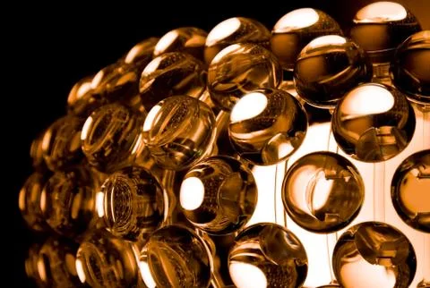 Glass spherical design elements of modern chandelier Stock Photos