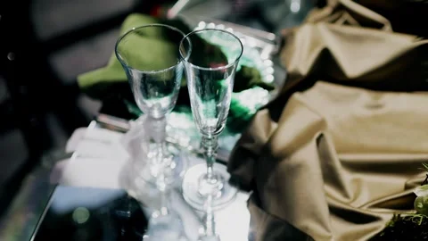 The glass stands on a table draped for the occasion Stock Footage 337973094