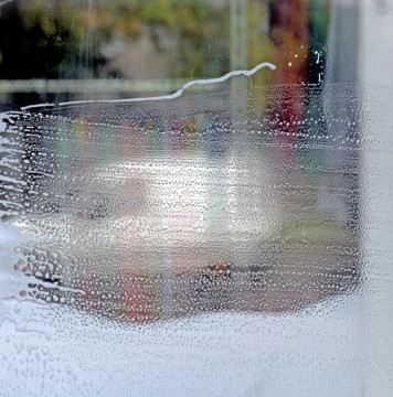 Glass surface in soapsuds Stock Photos