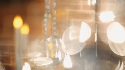 The glass is on the table in the glare of the lights	 Stock Footage 124374481