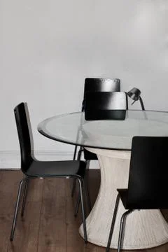 Glass table in room Stock Photos