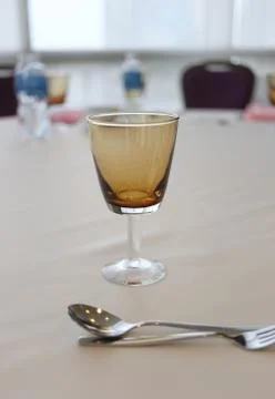 Glass on the tableware. Stock Photos