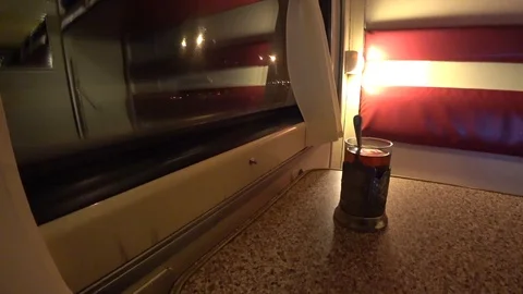 A glass of tea in the long-distance train Stock Footage 88352866
