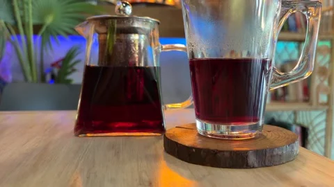 Glass of Tea on Table in Cafe Warm Drink Close Up Stock Footage 333825386