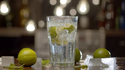 Glass with tonic on the table Stock Footage 125502165