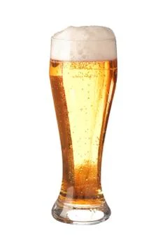 Glass of translucent frothy beer Stock Photos