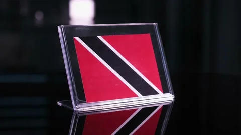 Glass Trinidad Tobago Flag Rotating On Table 動画素材 208522453