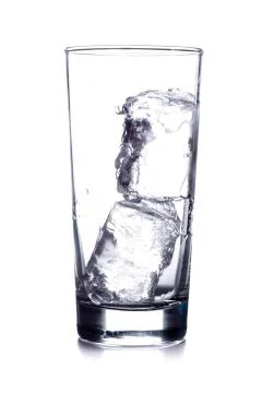 Glass with two ice Stock Photos
