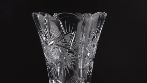 Glass vase rotating on a black background Stock Footage 142170534