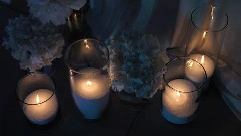 Glass vases with burning candles as boho rustic wedding ceremony decor. Stock Footage 338333301