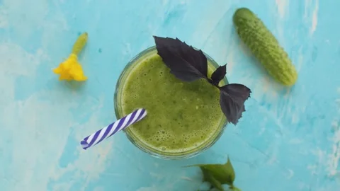 Glass of vegetable smoothie, rotation Stock Footage 137021804