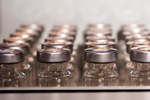 Glass vials for liquid samples. Laboratory equipment for dispensing fluid sam Stock Photos