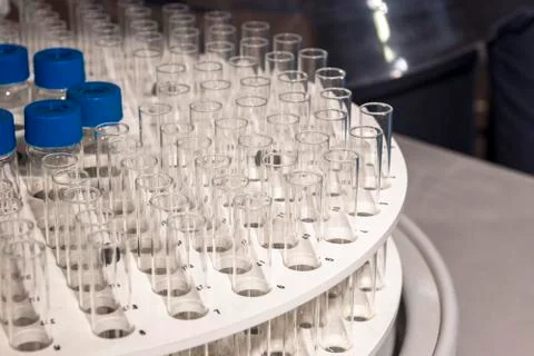 Glass vials for liquid samples. Laboratory equipment for dispensing fluid sam Stock Photos