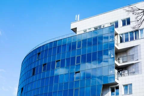 Glass wall facade with cloud sky reflection. Modern urban architecture backgr 스톡 사진