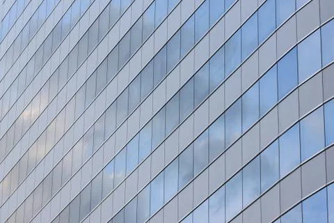 Glass wall of a skyscraper. Stock Photos