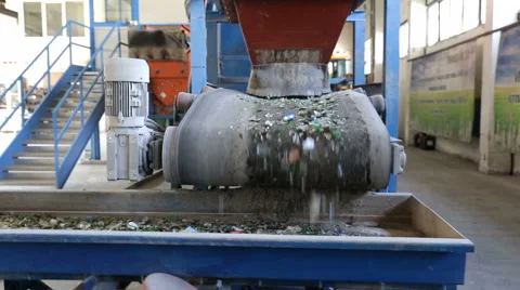 Glass waste in recycling facility. Glass particles on line Stock Footage