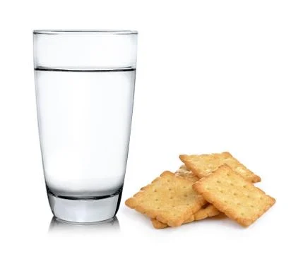 Glass of water and Cracker on white background Stock Photos