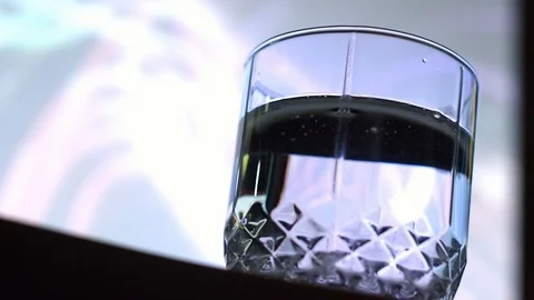 In a Glass of Water, Aspirin Dissolves Stock Footage 87054817