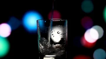 A glass of water on a beautiful background Stock Footage 85676650