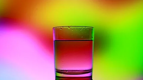 A glass of water on a beautiful background Stock Footage 85676684