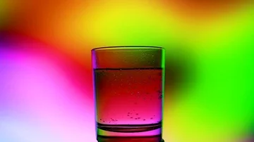 A glass of water on a beautiful background Stock Footage 85676710