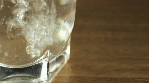 Glass of water on a table, macro Vidéo 58060205