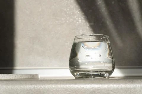 Glass of water on the table Stock Photos