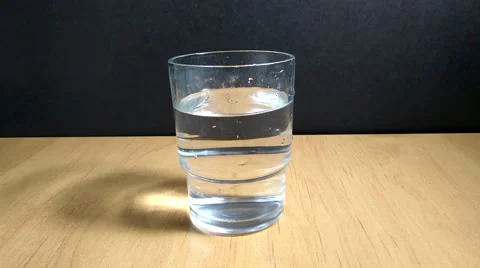 In a glass of water  throw effervescent tablet Stock-Footage 68711107