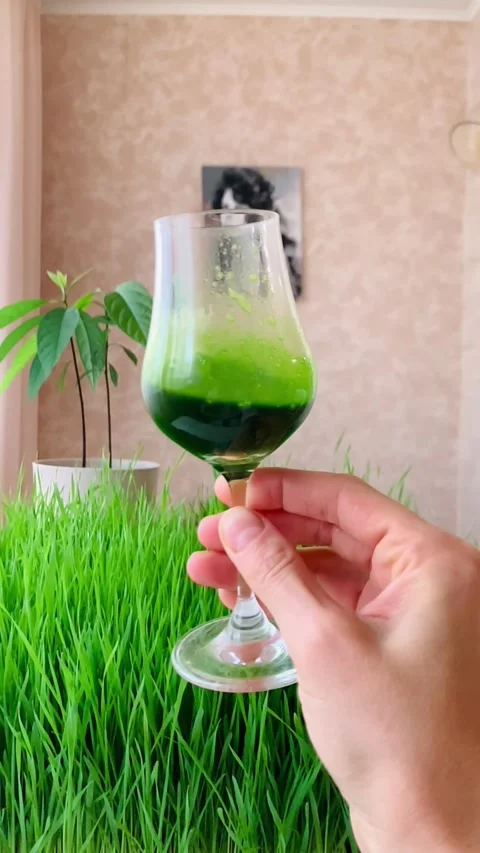 A glass of wheatgrass. Stock Footage 293725070